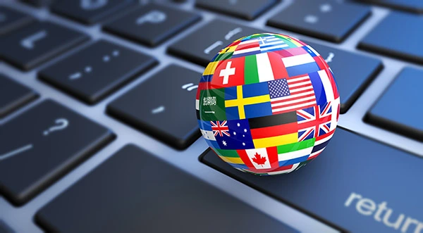 International,Business,Concept,With,A,Computer,Keyboard,And,World,Flags translations services